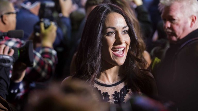 WWE star Brie Bella arrives at the Hard Rock Cafe in Manhattan Tuesday, April 1, 2014, as they kick off Wrestlemania 30 during a week long list of activities leading to the April 6th main event.