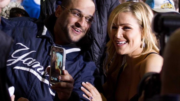 WWE Diva Natayle spends time with fans as she arrives at the Hard Rock Cafe in Manhattan Tuesday, April 1, 2014, as they kick off Wrestlemania 30 during a week long list of activities leading to the April 6th main event.