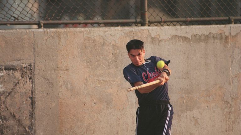 Classic street games: Stickball, handball and more 14 Michael J. Kormusis of the Whitestone Chiefs gets a hit in stickball league play at Junior High School 185 in Whitestone in 1999.
