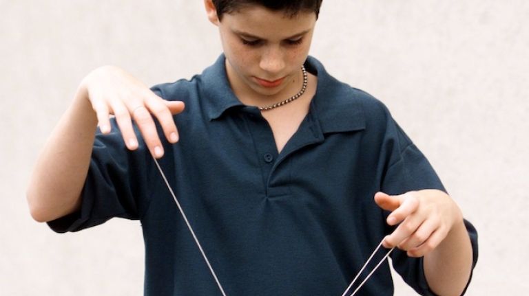 Classic street games: Stickball, handball and more 15 Paul Adam Bernacchio,12, does tricks with a yo-yo in 1999.