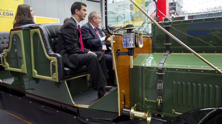 New York City District 10 Councilman Ydanis Rodriguez, center, a proponent of ending the horse and carriage trade in New York City, sits with others as the 