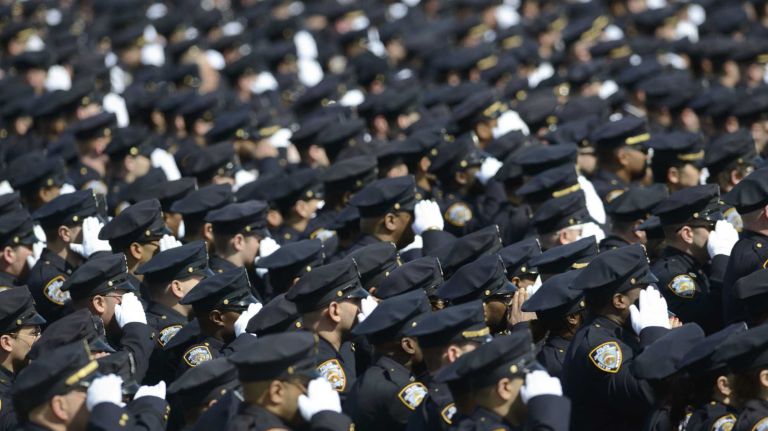 NYPD Officer Dennis Guerra remembered at memorial, funeral 33 Police officers salute as the coffin of NYPD Officer Dennis Guerra is carried into St. Rose of Lima Roman Catholic Church on Monday, April 14, 2014. Guerra, 38, died early Wednesday of smoke inhalation and carbon monoxide poisoning and leaves behind his wife, Cathy; and children Kathleen, 20, Jonathan, 17, Alyssa, 14, and Zachary, 7.