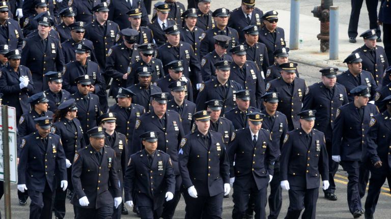 NYPD Officer Dennis Guerra remembered at memorial, funeral 45 Police arrive to pay respects at a funeral Mass at St. Rose of Lima Church April 14, 2014, in Queens for NYPD Officer Dennis Guerra. Guerra died on April 9, 2014 of smoke inhalation sustained during a fire on April 6 in Coney Island.