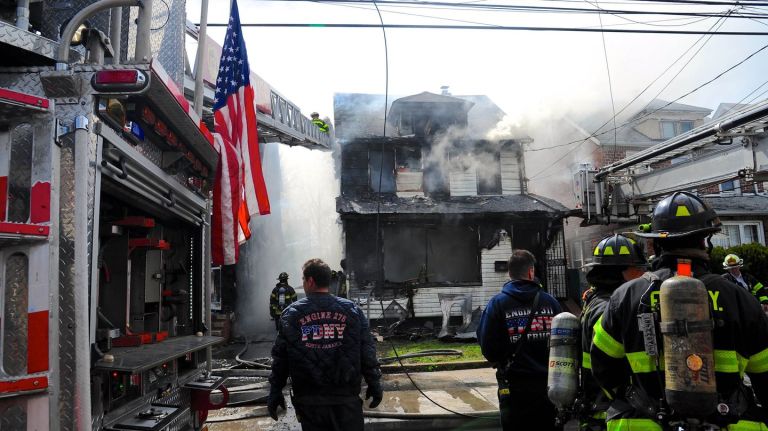 The victims  of the Queens Village house fire will be laid to rest on May 6, 2017. Above, the scene at 112th Avenue and 208th Street  on Sunday, April 23, 2017.