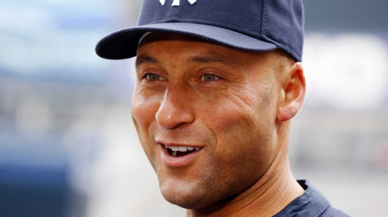 Derek Jeter of the New York Yankees smiles during an interview prior to the home opener against the Baltimore Orioles at Yankee Stadium on Monday, April 7, 2014.