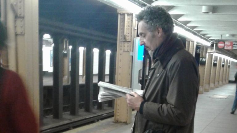 John Turturro talks about Brooklyn’s past and future while riding the B train 1 John Turturro reads a copy of the New York Times on Tuesday at the Seventh Avenue B/Q subway station in Brooklyn.