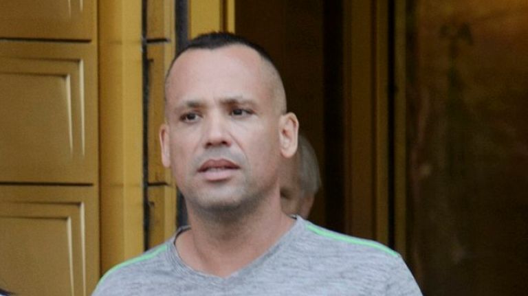 Ex-NYPD Sgt. David Villanueva  leaves the  federal courthouse in Manhattan on June 20, 2016, after being arraigned on  bribery charges.