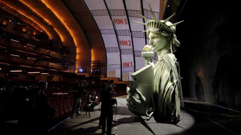 Lady Liberty, a 26-foot tall animatronic Statue of Liberty puppet, is operated onstage at Radio City on Feb. 18, 2014.