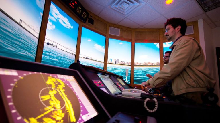 NYC Ferry operator Hornblower holds a training simulation at SUNY Maritime College in the Bronx for future ferry captains. Above: amNewYork reporter Vin Barone takes a test run.