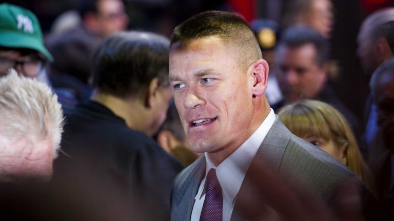 WWE superstar John Cena arrives at the Hard Rock Cafe in Manhattan Tuesday, April 1, 2014, as they kick off Wrestlemania 30 during a week long list of activities leading to the April 6th main event.