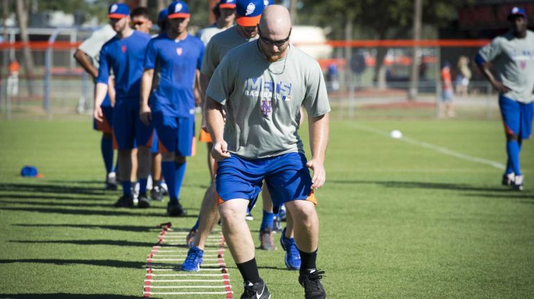 Members of the Mets do agility drills at the start of spring training on Monday, Feb. 17, 2014.