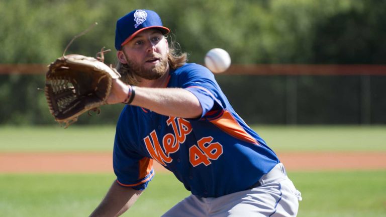 New York Mets pitcher Jeff Walters takes part in a drill during spring training on Tuesday Feb. 18, 2014, in Port St. Lucie, Fla.