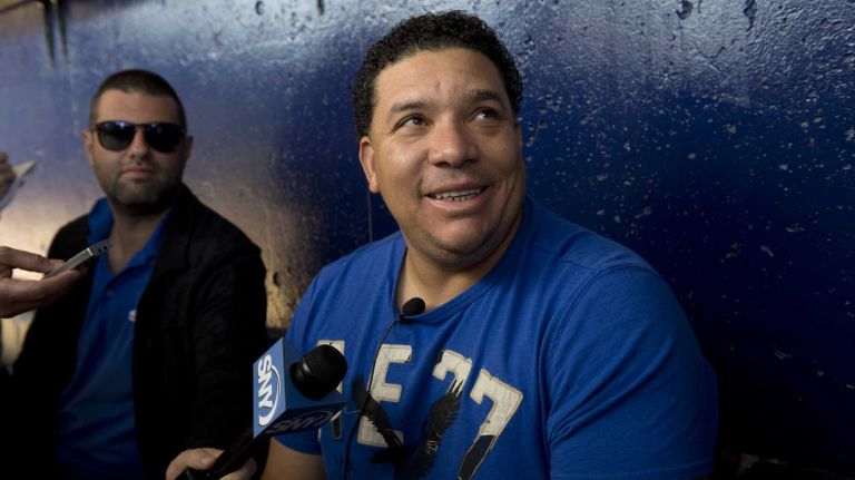 Mets pitcher Bartolo Colon talks to reporters after arriving at Tradition Field on Saturday, Feb. 15, 2014.