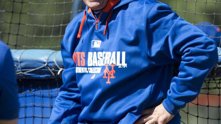 Mets manager Terry Collins shares a laugh with some of the players Friday, Feb. 14, 2014, during spring training in Port St. Lucie, Fla.