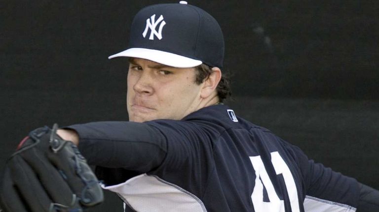 Yankees pitcher David Phelps works out at Steinbrenner Field on Feb. 17, 2014.