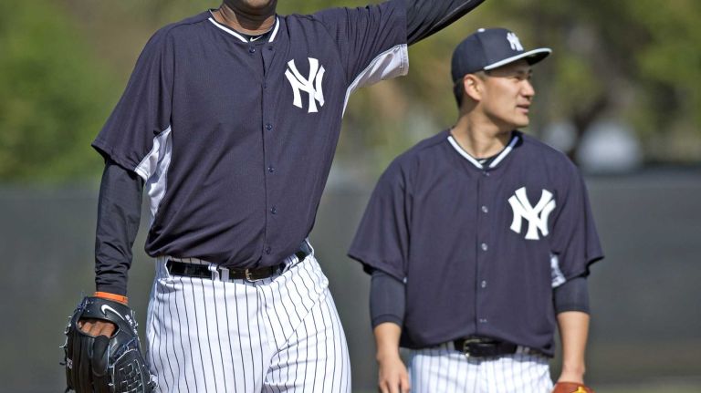 Yankees' CC Sabathia and Masahiro Tanaka work out at Steinbrenner Field on the morning of Feb. 15, 2014.