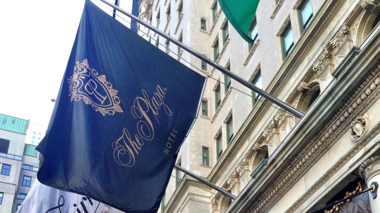Photo of the day 11 MARCH 6, 2014: Flags wave in the frigid breeze outside The Plaza hotel in New York City.