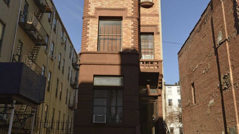 This compact South Harlem apartment building is located at 165 West 122nd St. between Adam Clayton Powell Boulevard and Lenox Avenue.