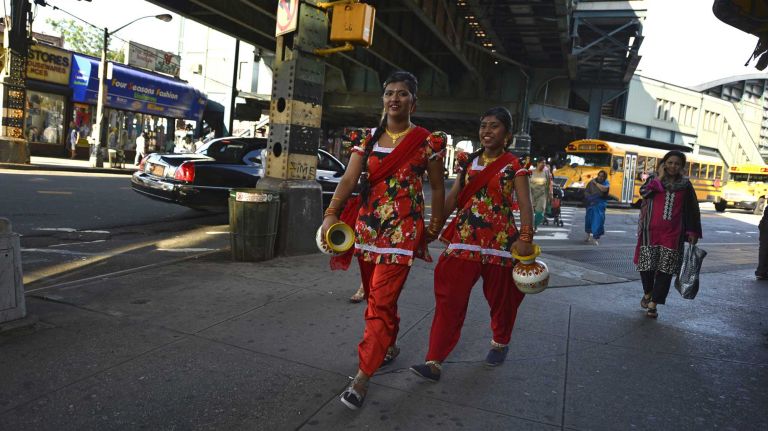 Jackson Heights 14 Friends walk along Roosevelt Avenue on their way to a Bangladeshi festival. (June 15, 2013)