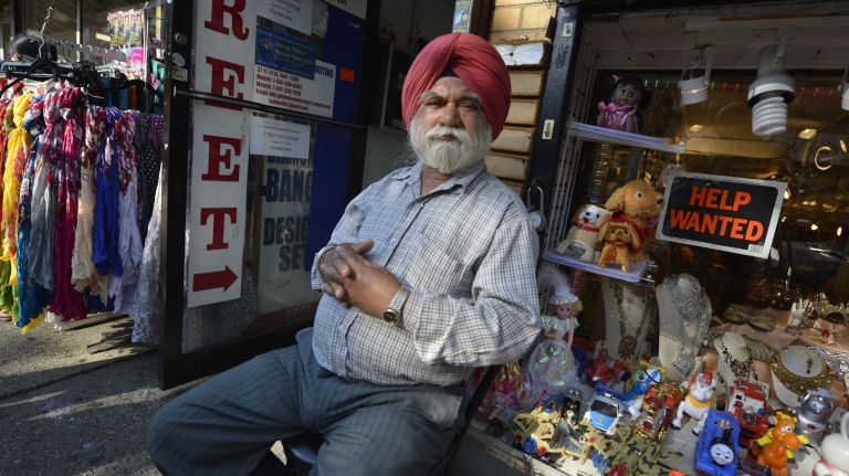 Jackson Heights 16 A shopkeeper on 74th Street in the Little India section of Jackson Heights. (June 15, 2013)