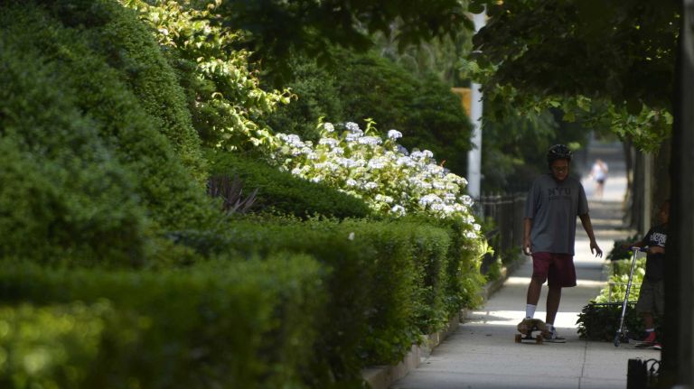 Jackson Heights 19 Jackson Heights resident David Murray, 10, plays along 80th Street in Jackson Heights. (June 15, 2013)