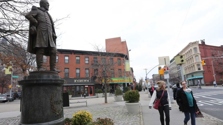 A statue of Gen. Edward Fowler, who led a New York regiment during the Civil War, stands proudly at the square named after him. (Dec. 4, 2013)