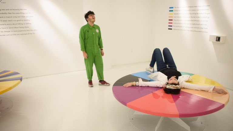 Inside the Color Factory NYC, a vibrant pop-up that lights up your inner child 16 A woman spins on a disk at