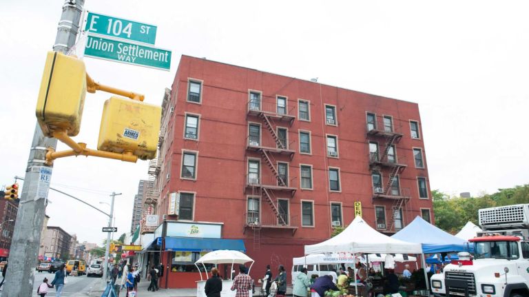East Harlem 1 Residents of East Harlem check out the Harvest Home Union Settlement Market on 104th St.
