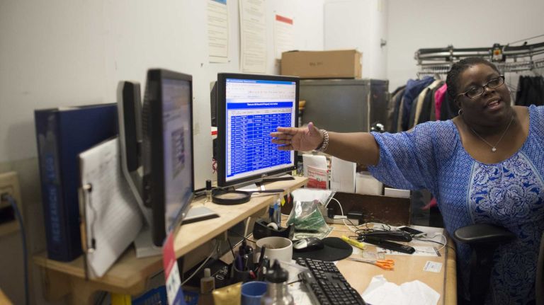 Melissa Gissentanner, the manager at the MTA's Metro-North Railroad Lost & Found in Grand Central Terminal, shows how recovered items are cataloged on August 28, 2013.