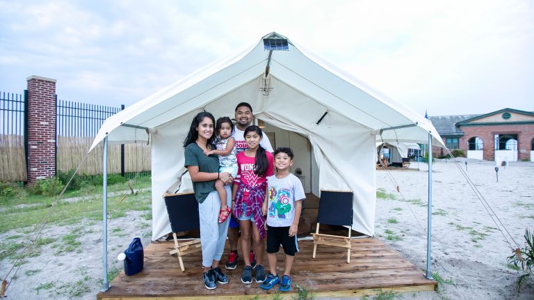 The Jalosjos family of New Jersey -- from left, Gziel, Ghiemel, 3, Carmelo, Cariel, 12, Carmelo Jr., 9 -- at Camp Rockaway on Friday.
