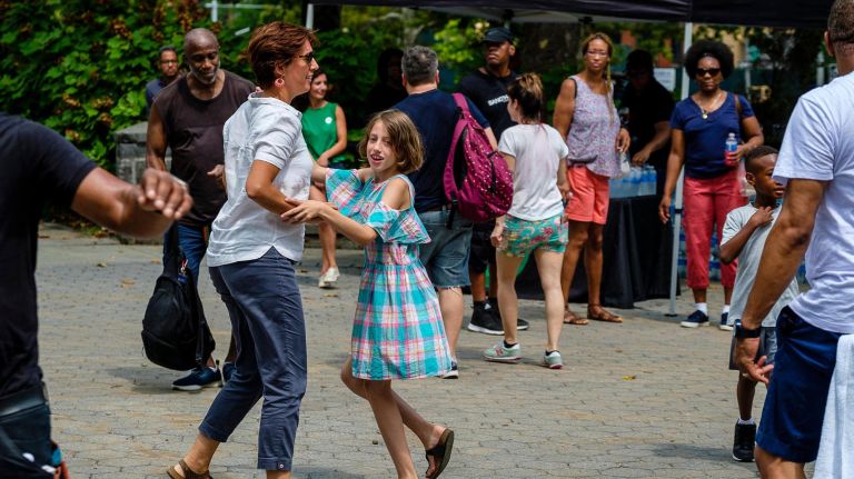 Sundae Sermon brings Harlem out to dance at St. Nicholas Park 17 Maya Zanchini, right, visiting from Rome, Italy, shows off her dance moves with her mom.