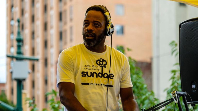 Sundae Sermon brings Harlem out to dance at St. Nicholas Park 18 DJ Stormin Norman spins tunes.