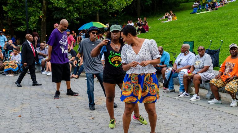 Sundae Sermon brings Harlem out to dance at St. Nicholas Park 20 Music by DJ Stormin Norman gets people dancing.