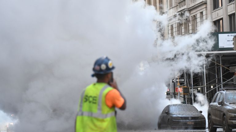 Fifth Avenue fills with smoke after steam pipe explodes: Photos 7 First responders evacuated the area and set up decontamination tents after the steam pipe explosion.