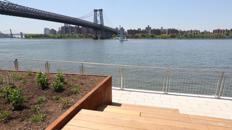 A walking path offers spots to stop and sit. 