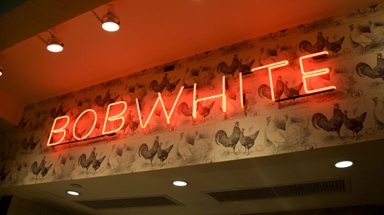 Bobwhite, the Alphabet City lunch and supper counter serving fried chicken and soul food sides made from sustainable ingredients, has decorated its stall with some unique, foul-decorated wallpaper.