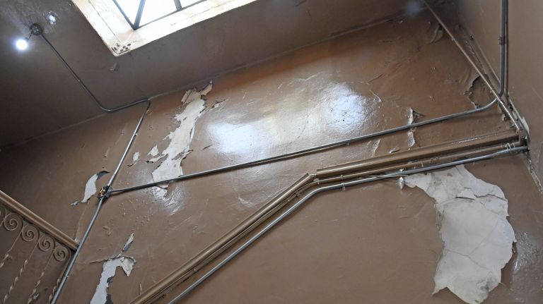 Bronx landlord accused of neglecting tenants: Photos 17 Water damage is seen on the hallway wall a Bronx building where leaks are a constant problem, tenants say.