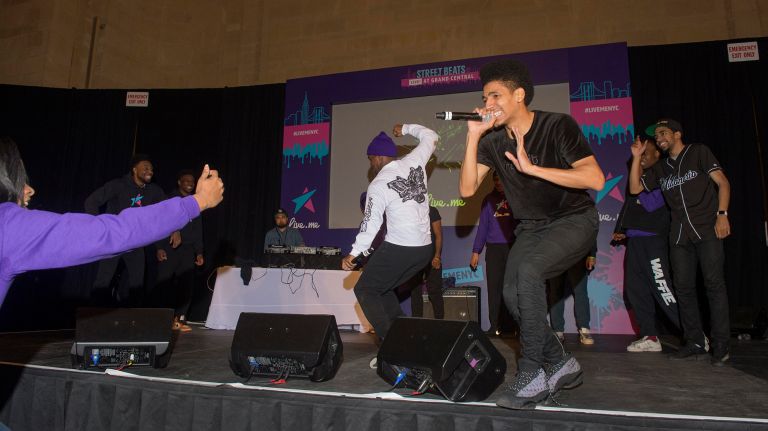 Sean Kirkland, 26, and members of Brooklyn's Waffle Crew flipped, sang and danced through their stage time during the event. 