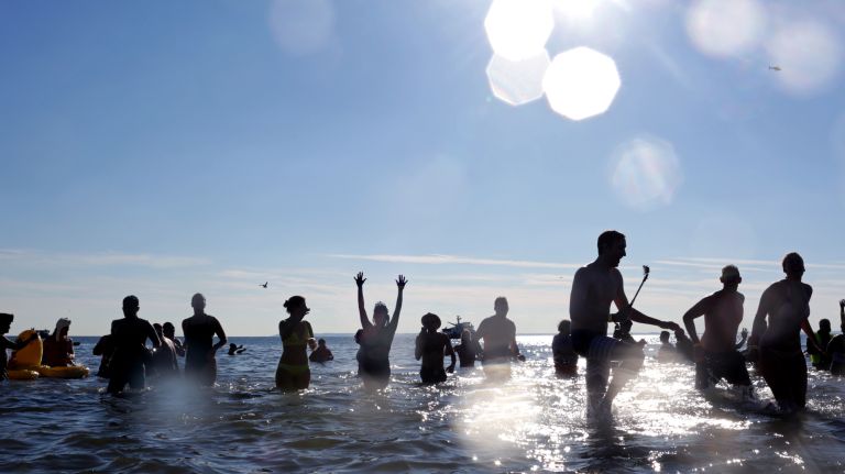 Swimmers participate in the Coney Island Polar Bear Club's New Year's Day Swim on Jan. 1, 2017.
