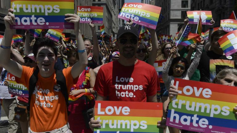NYC Pride March 2016: See photos of the annual march to commemorate the Stonewall riots 98 Hillary Clinton supporters march in the New York City Pride March on Fifth Avenue in Manhattan on Sunday, June 26, 2016. This year's Pride parade pays tribute to the 49 killed in the shooting at a gay nightclub in Orlando, Florida, two weeks ago on June 12.