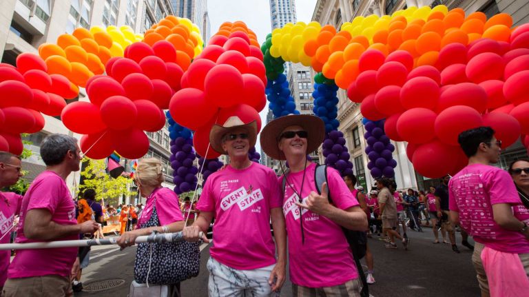 NYC Pride March 2016: See photos of the annual march to commemorate the Stonewall riots 113 Robert Welsch and David Davenport, who have been married for 26 years, work as volunteers at the 46th annual New York City Pride March on Fifth Avenue in Manhattan on Sunday, June 26, 2016. This year's Pride parade pays tribute to the 49 killed in the shooting at a gay nightclub in Orlando, Florida, two weeks ago on June 12.