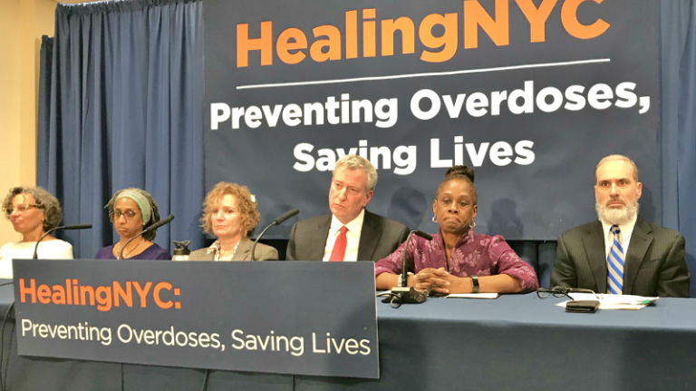 Mayor Bill de Blasio, center, joins First Lady Chirlane McCray and Staten Island Borough President James Oddo, right, in announcing $22 million in funding to combat opioid addiction at a press conference Monday at Richmond University Medical Center in Staten Island. 