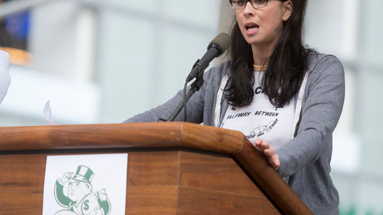 Comedian and actress Sarah Silverman speaks to protesters at Bryant Park during the Tax March on April 15, 2017.