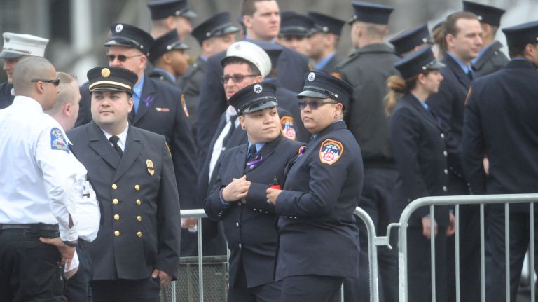 Mourners gather Saturday, March 25, 2017, for the funeral of slain FDNY EMT Yadira Arroyo in St. Nicholas of Tolentine Roman Catholic Church on University Avenue in the Bronx.