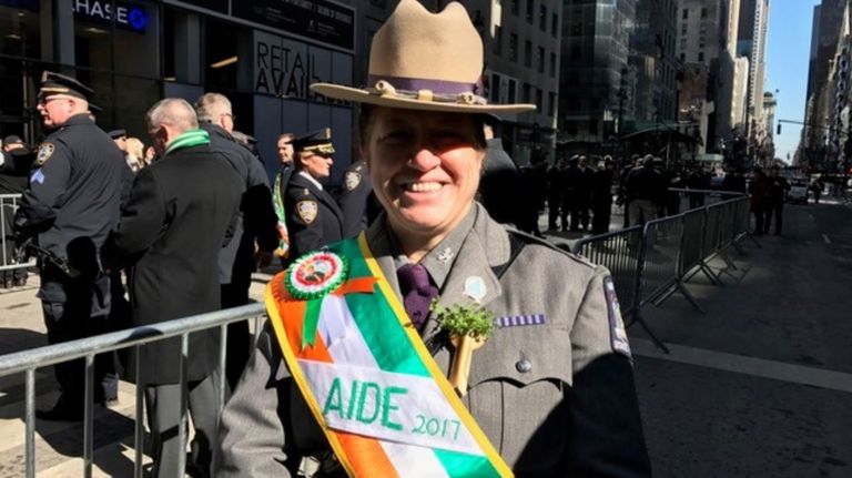 Col. Tricia Groeber, of Bethpage, waits for the start of the St. Patrick's Day parade on Fifth Avenue in Manhattan Friday, March 17, 2017.