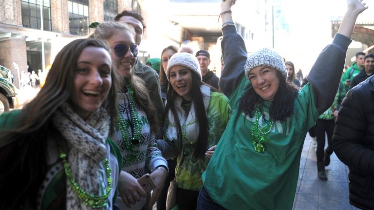Parade attendees get ready to enjoy the St. Patrick's Day parade on Fifth Avenue in Manhattan Friday, March 17, 2017.