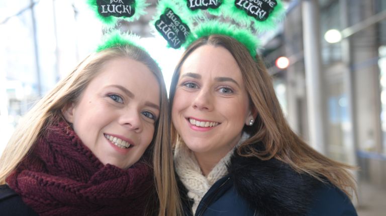Melissa Mcintyre, left, and Emma Pyper are ready for the St. Patrick's Day parade on Fifth Avenue in Manhattan Friday, March 17, 2017.