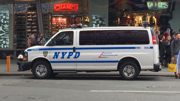 A Molotov cocktail was thrown at an NYPD vehicle on Staten Island on Wednesday, March 15, 2017, police said. Above, an NYPD van is parked on the street in New York City.
