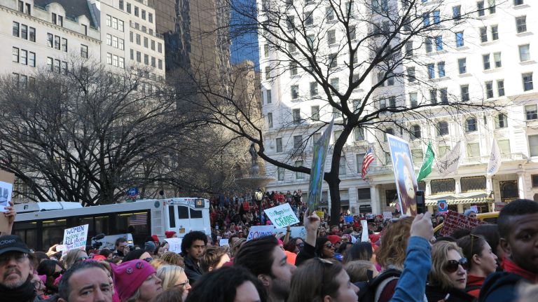 Crowds gather at the A Day Without a Woman rally held near 59th Street and Fifth Avenue in Manhattan on Wednesday, March 8, 2017.
