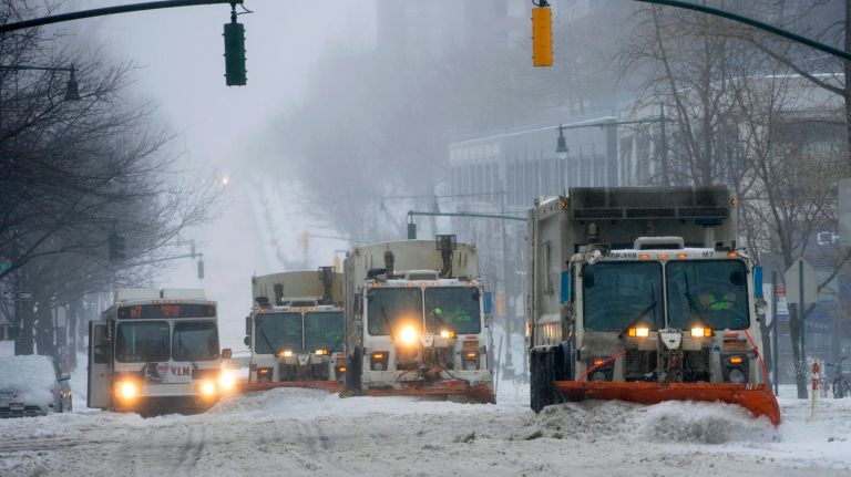 Plows make their way along Columbus Avenue on the Upper West Side during a snowstorm on Tuesday, March 14, 2017.